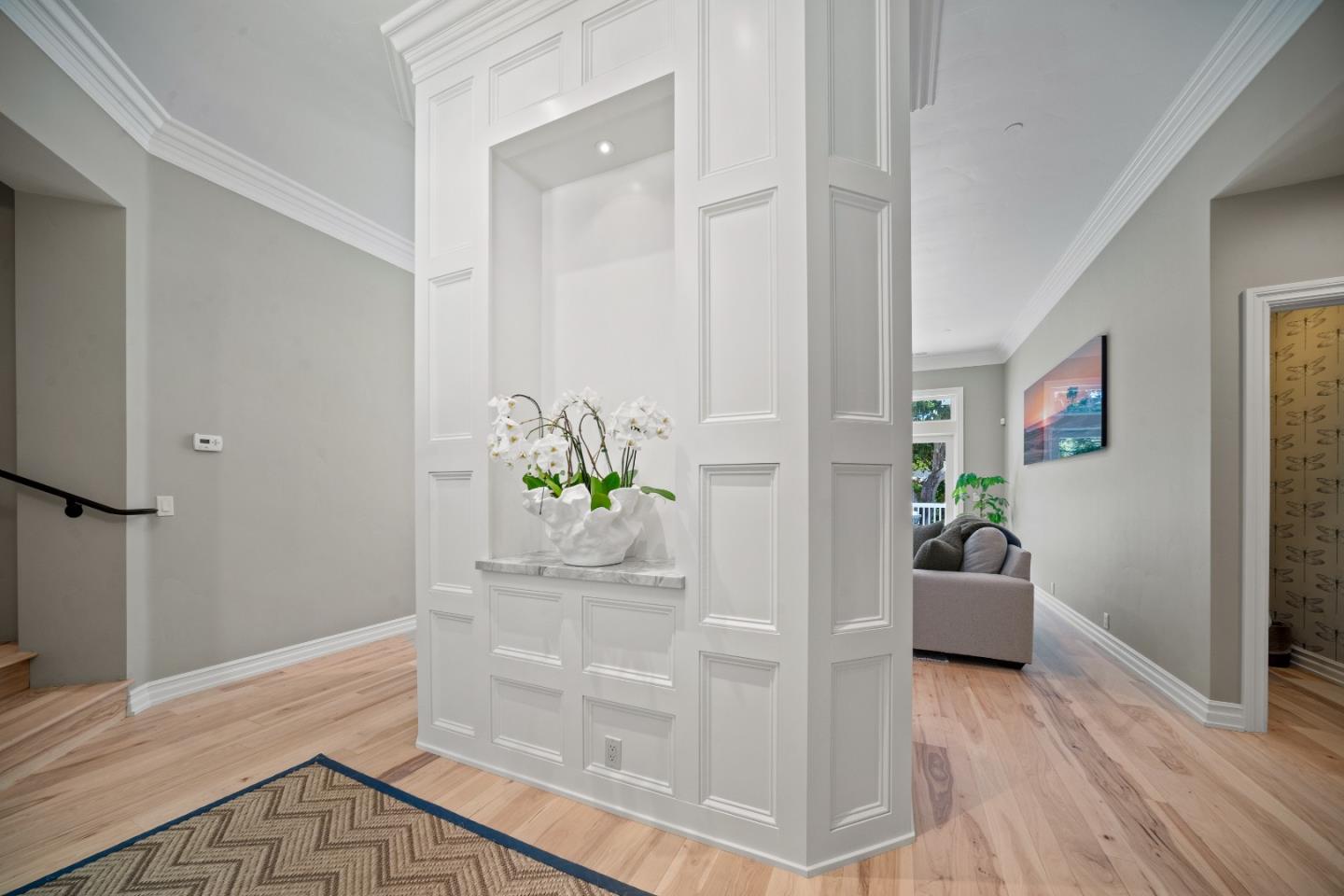 2823 Congress Road Pebble Beach, CA 93953 - Photo 34 of 49 a hallway with a dining table and chairs