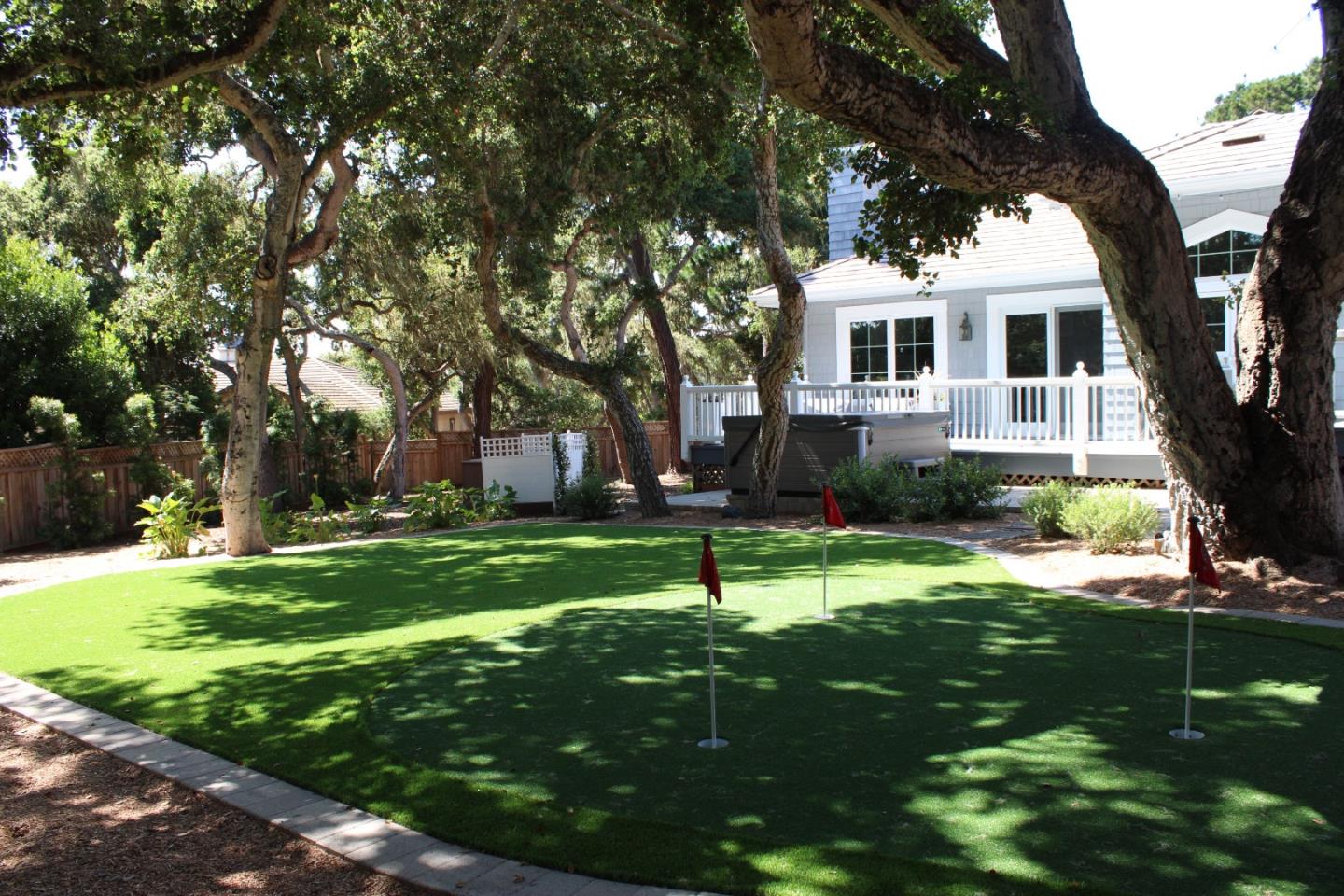 2823 Congress Road Pebble Beach, CA 93953 - Photo 37 of 49 a house view with a sitting space and garden