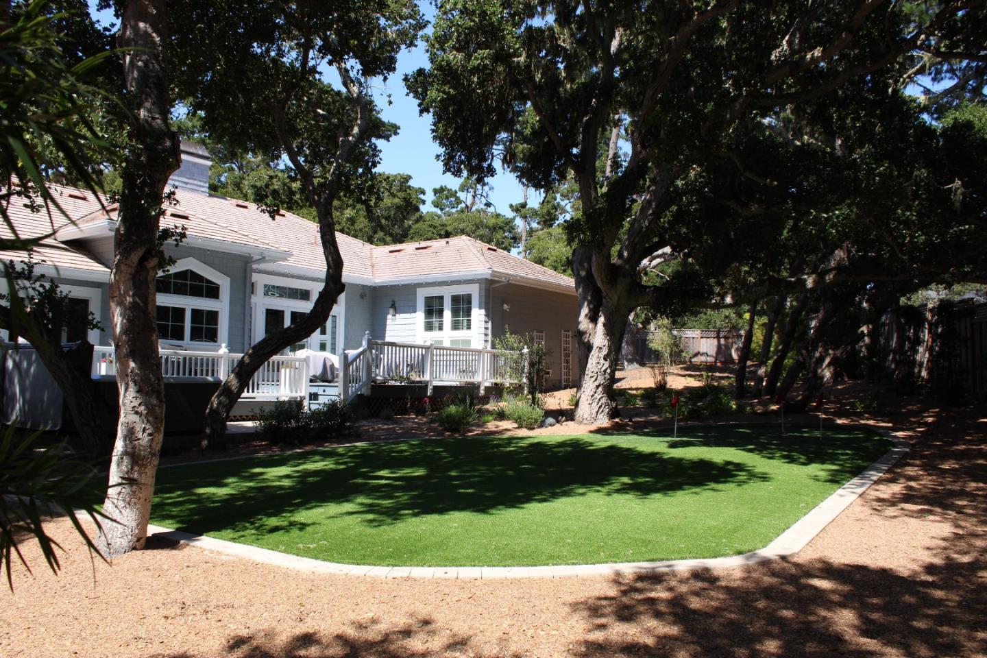 2823 Congress Road Pebble Beach, CA 93953 - Photo 45 of 49 a front view of a house with garden
