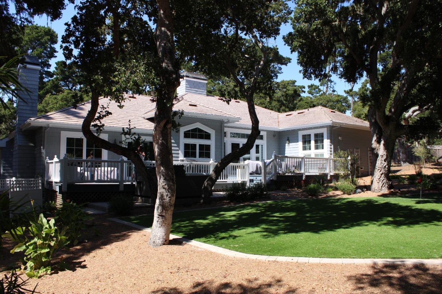2823 Congress Road Pebble Beach, CA 93953 - Photo 46 of 49 a front view of a house with a yard