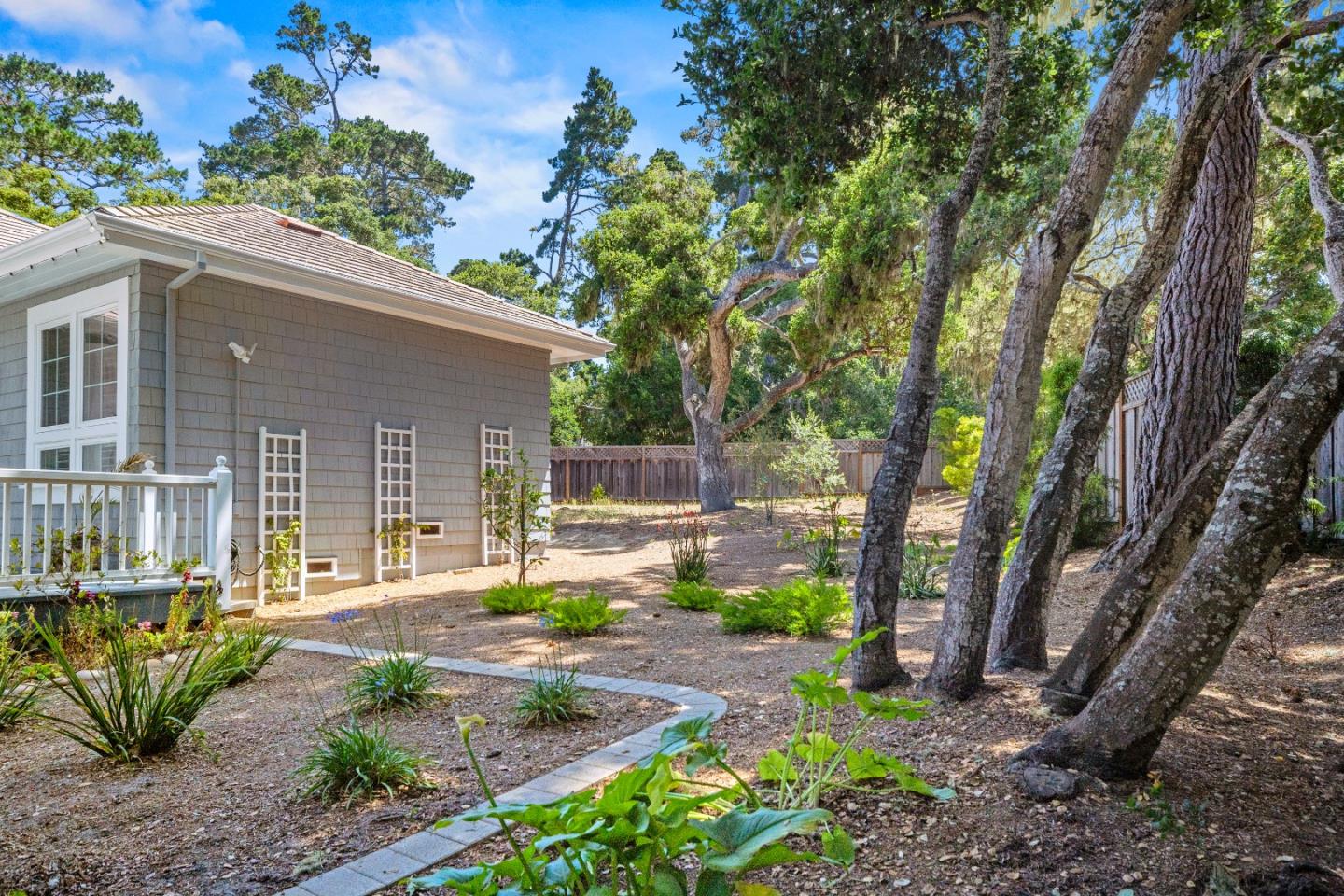 2823 Congress Road Pebble Beach, CA 93953 - Photo 48 of 49 a view of a house with backyard and sitting area
