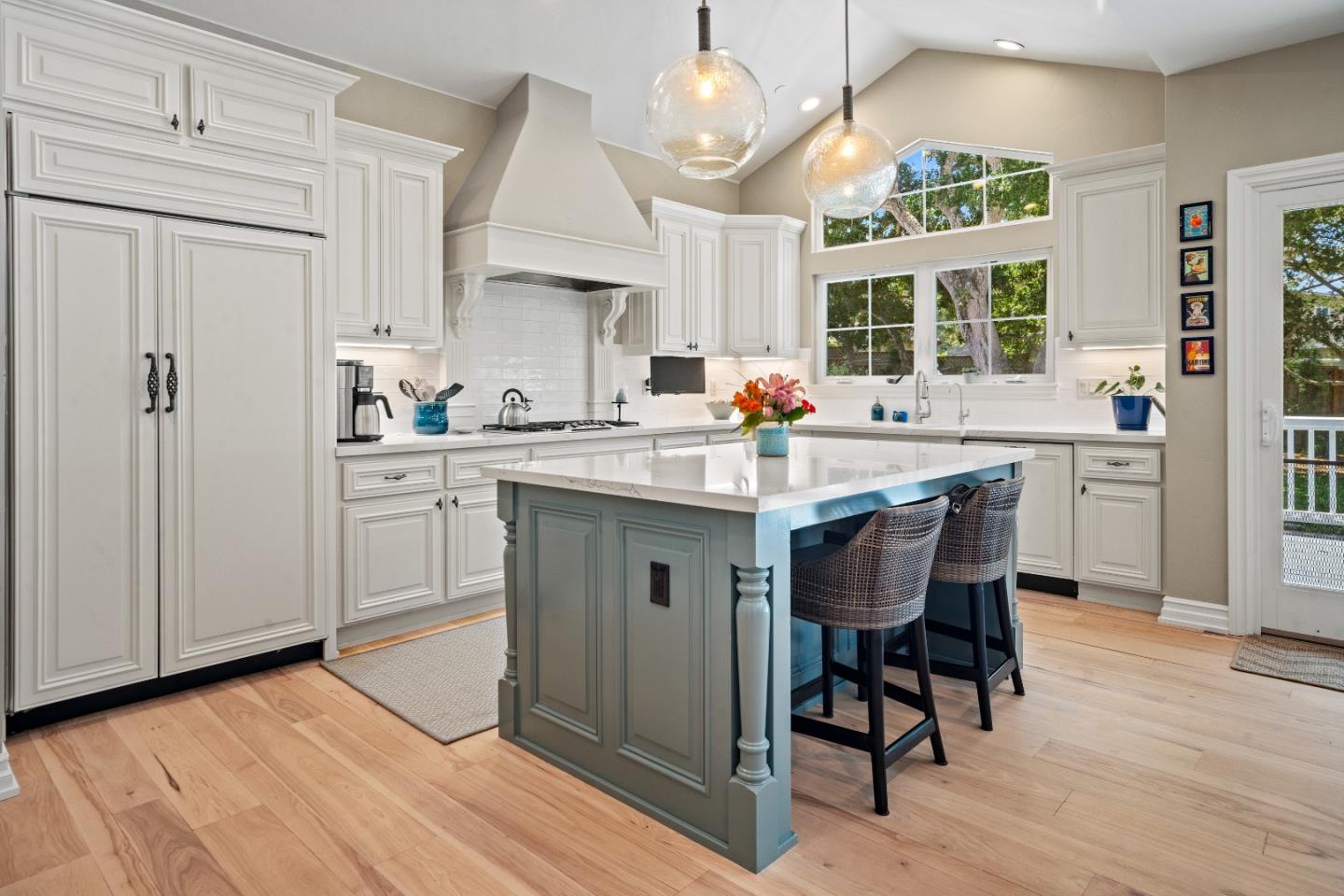 2823 Congress Road Pebble Beach, CA 93953 - Photo 5 of 49 a kitchen with a sink cabinets and wooden floor