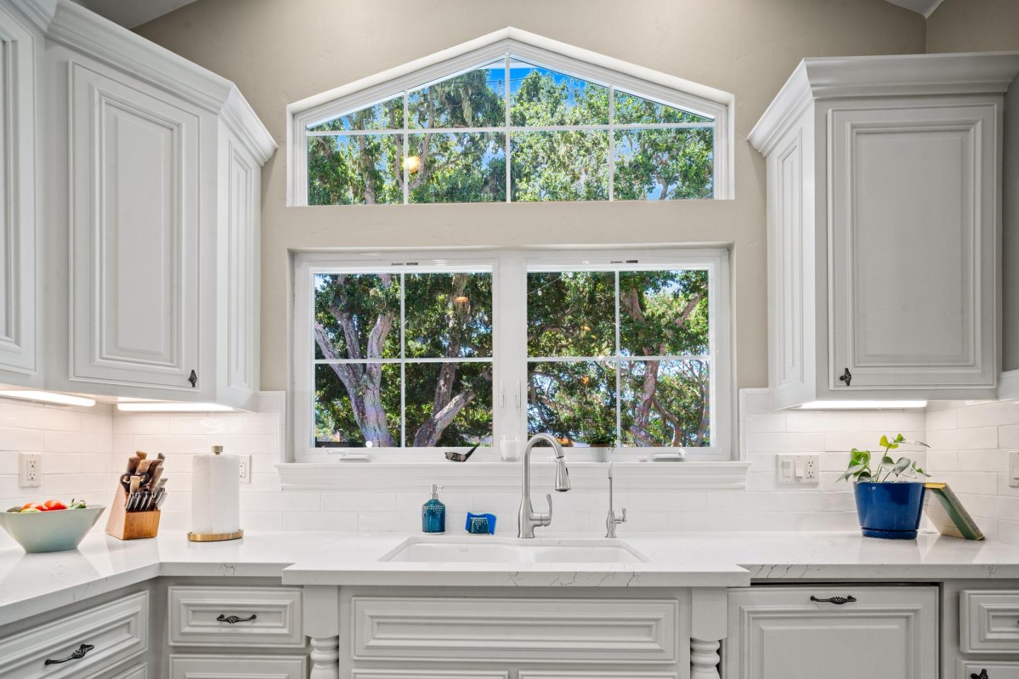 2823 Congress Road Pebble Beach, CA 93953 - Photo 7 of 49 a kitchen with a sink and large window