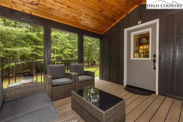 a living room with a couch and a table