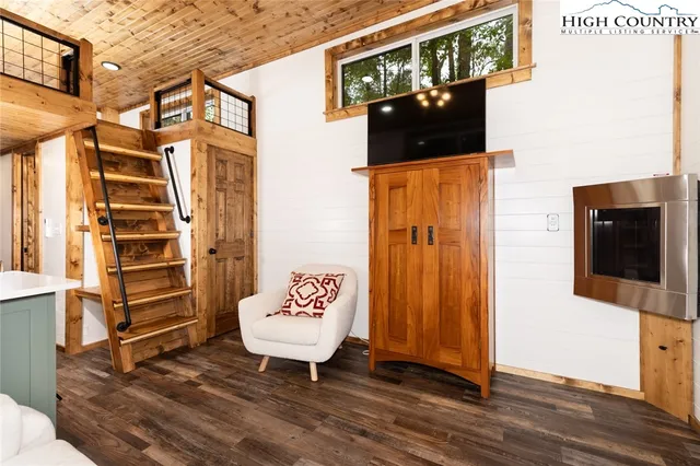 a bathroom with a sink a mirror and a bathtub