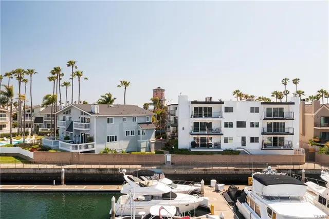 a front view of a building with outdoor seating