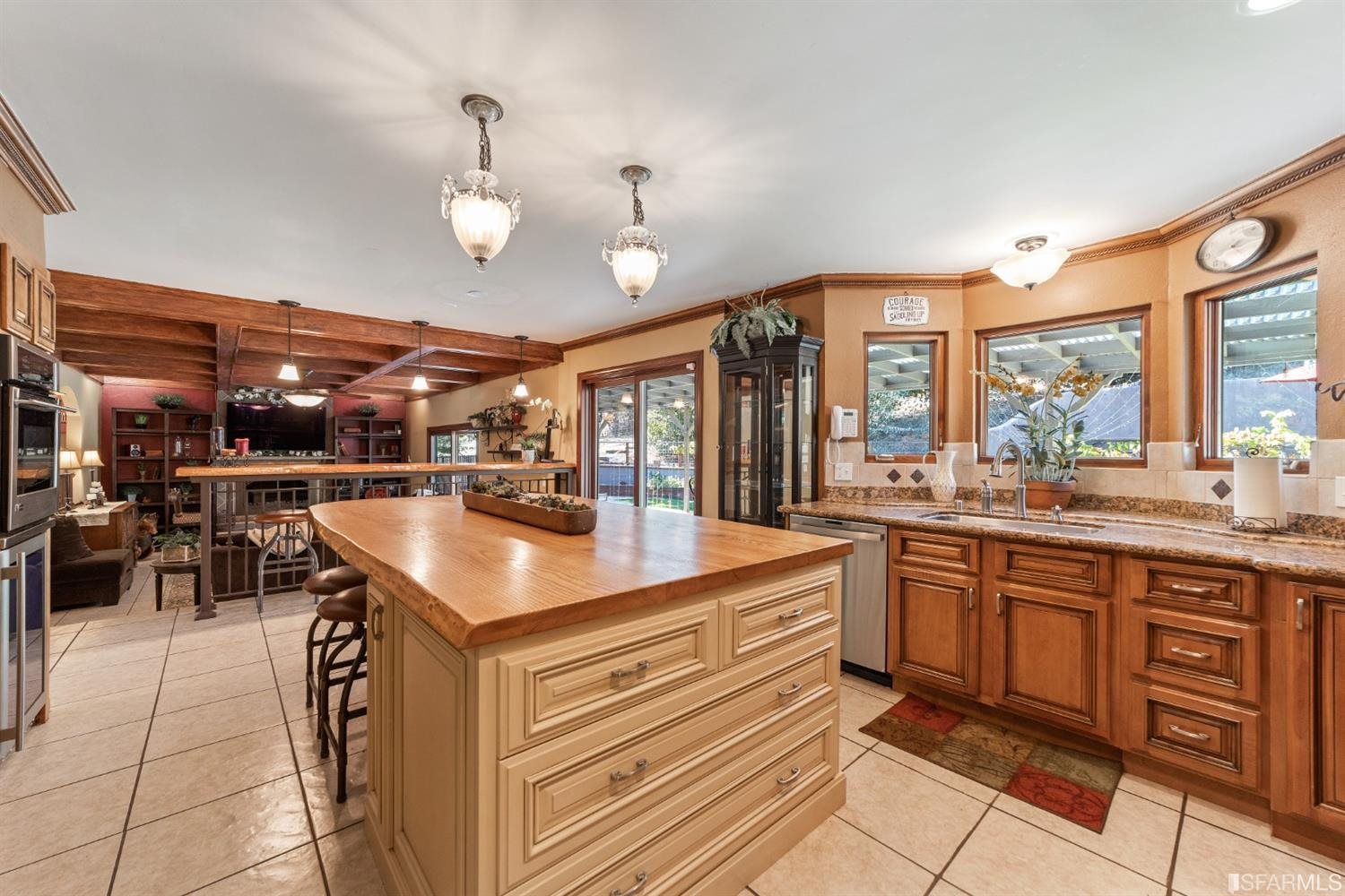 4912 John Muir Road Martinez, CA 94553 - Photo 13 of 59 a kitchen with stainless steel appliances granite countertop a sink and cabinets