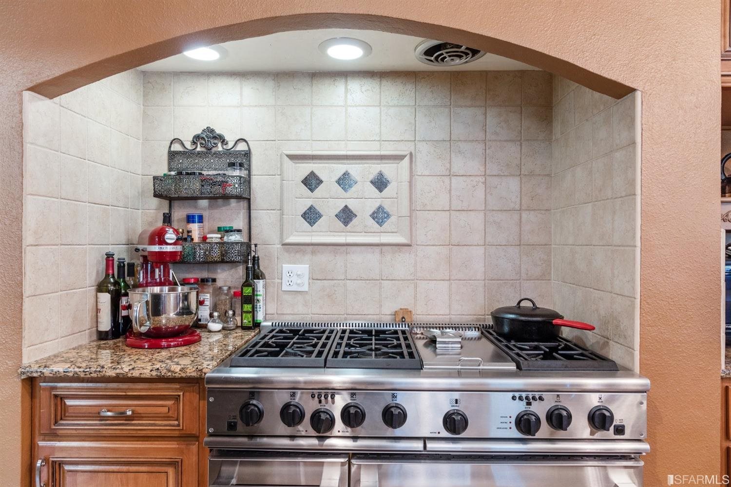 4912 John Muir Road Martinez, CA 94553 - Photo 15 of 59 a stove top oven sitting inside of a kitchen