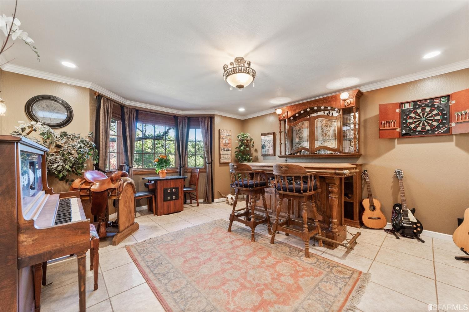 4912 John Muir Road Martinez, CA 94553 - Photo 22 of 59 a view of a dining room with furniture window and outside view