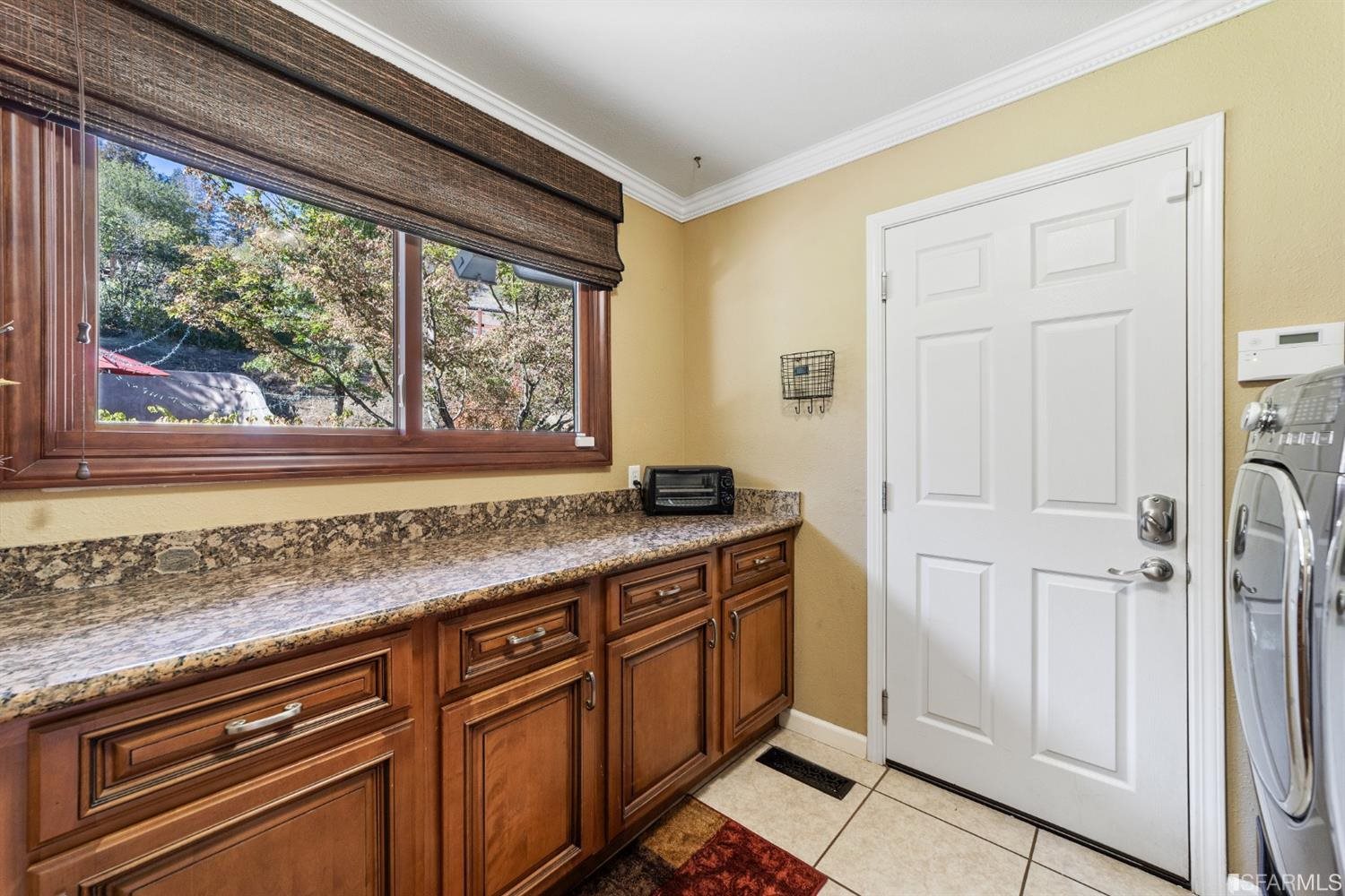 4912 John Muir Road Martinez, CA 94553 - Photo 26 of 59 a kitchen with stainless steel appliances granite countertop a refrigerator and a sink