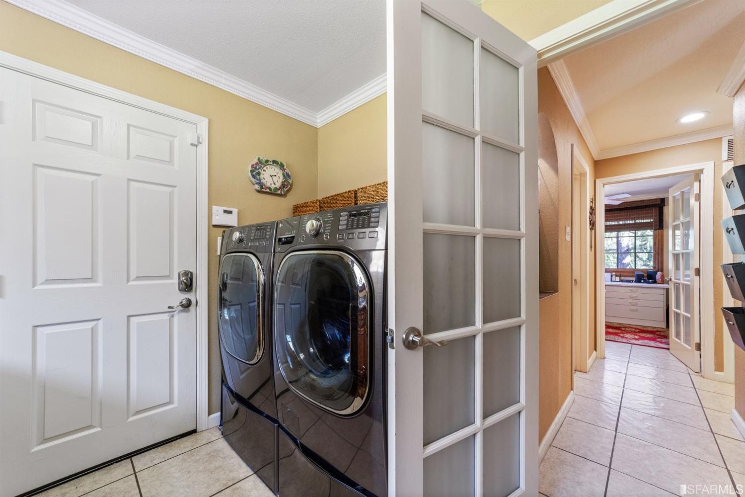 4912 John Muir Road Martinez, CA 94553 - Photo 27 of 59 a view of a storage & utility room with washer and dryer