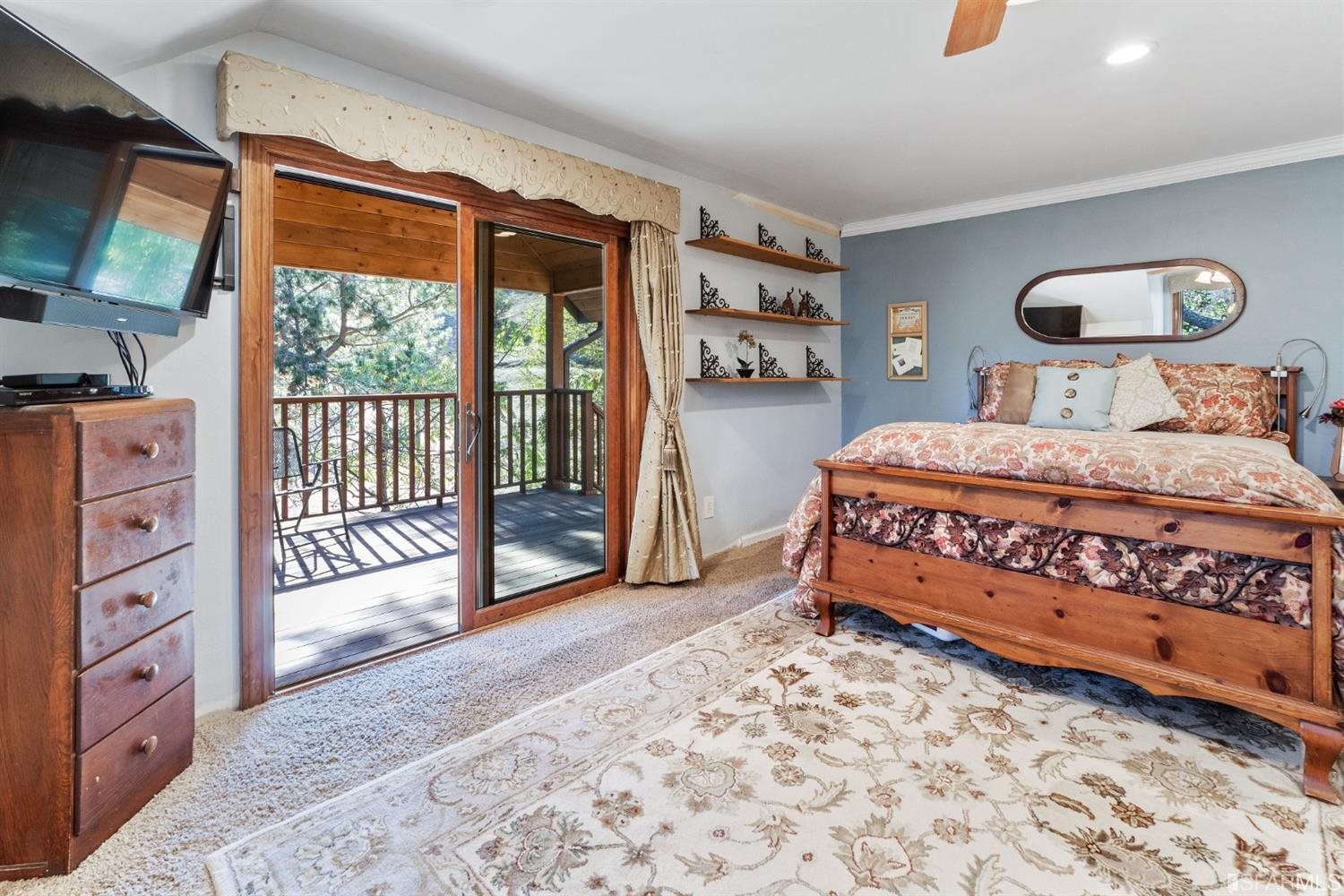 4912 John Muir Road Martinez, CA 94553 - Photo 30 of 59 a bedroom with a bed and a dresser next to a window