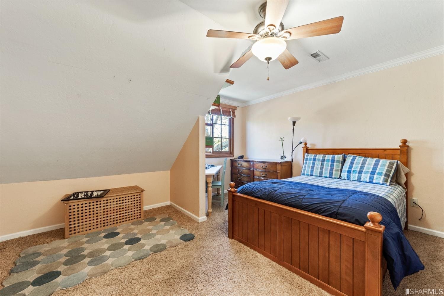 4912 John Muir Road Martinez, CA 94553 - Photo 35 of 59 a bedroom with a bed and ceiling fan