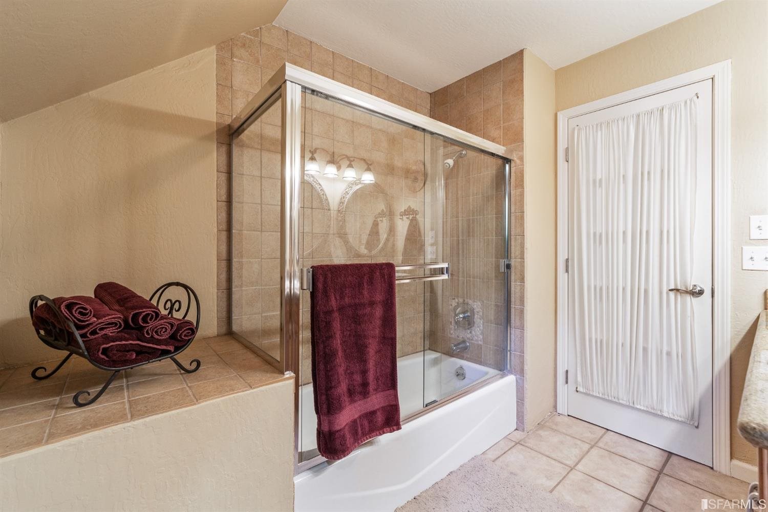 4912 John Muir Road Martinez, CA 94553 - Photo 40 of 59 a bathroom with a tub and shower
