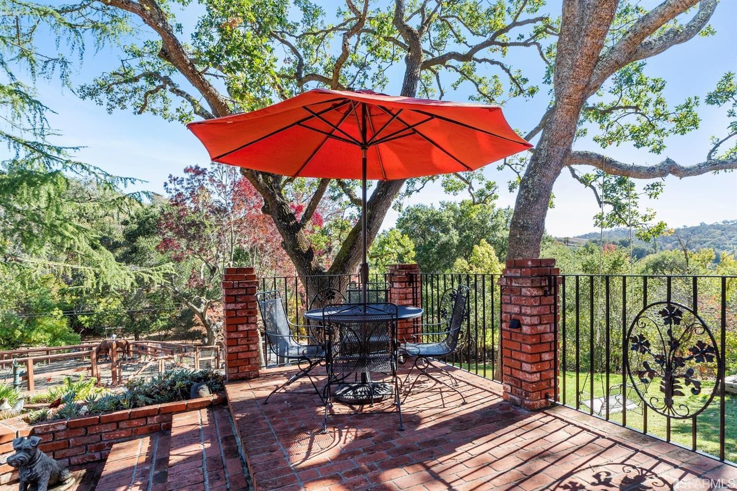 4912 John Muir Road Martinez, CA 94553 - Photo 5 of 59 a view of balcony with wooden floor and outdoor seating