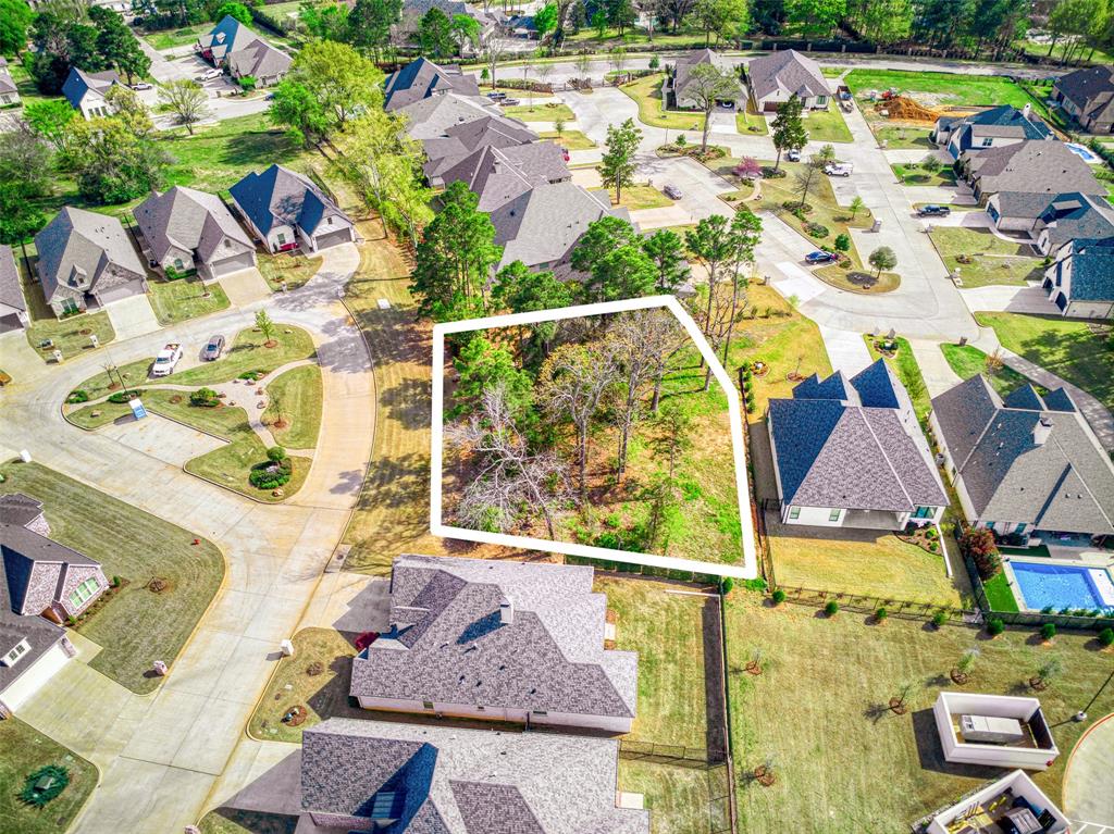 7318 Crosswater Cove Tyler, TX 75703 - Photo 5 of 5 an aerial view of residential houses with outdoor space