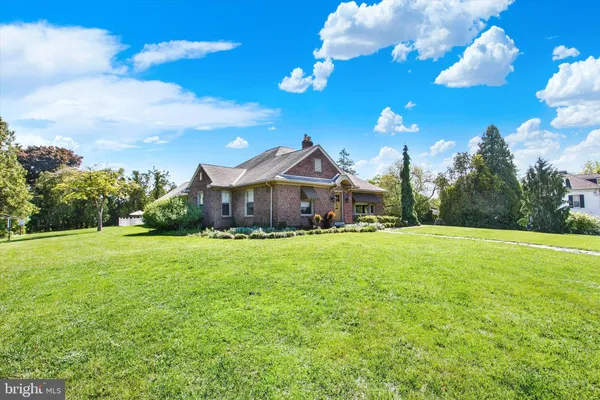 a house view with a garden space
