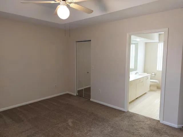 an empty room with a bathroom