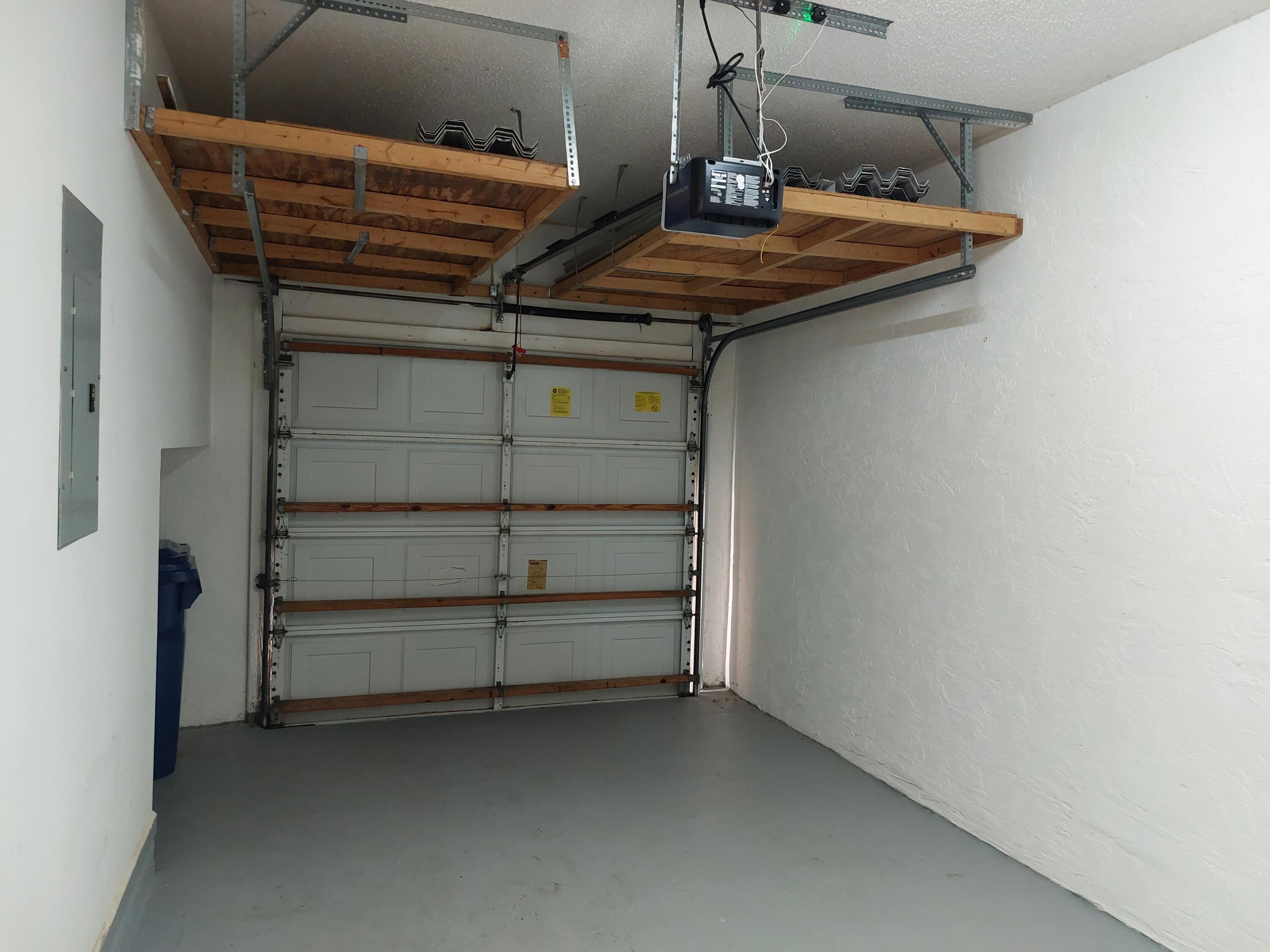 331 Oak Crest Terrace, Unit 331 Jupiter, FL 33458 - Photo 26 of 29 a view of storage and utility room