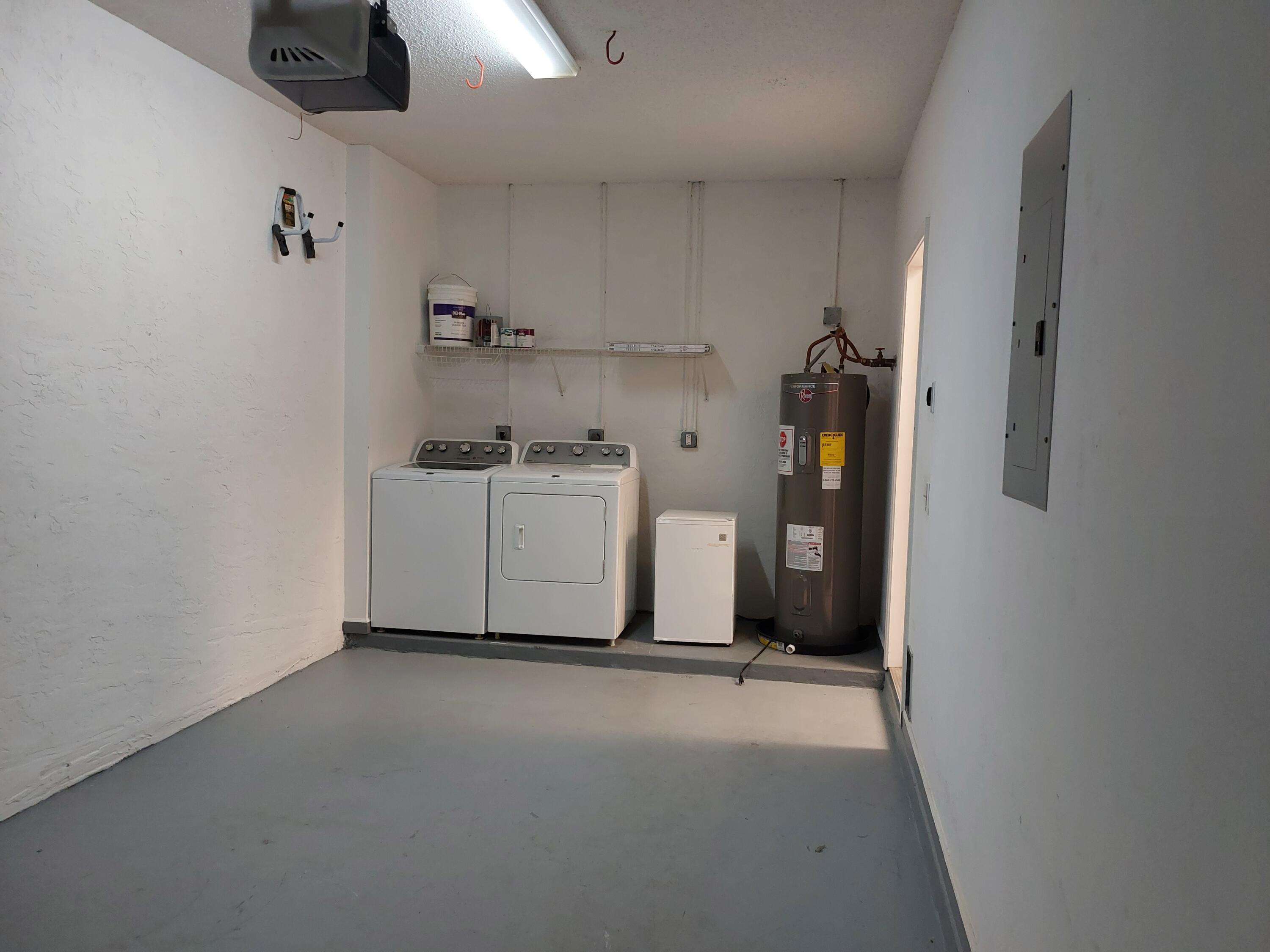331 Oak Crest Terrace, Unit 331 Jupiter, FL 33458 - Photo 27 of 29 a view of a storage & utility room with a sink