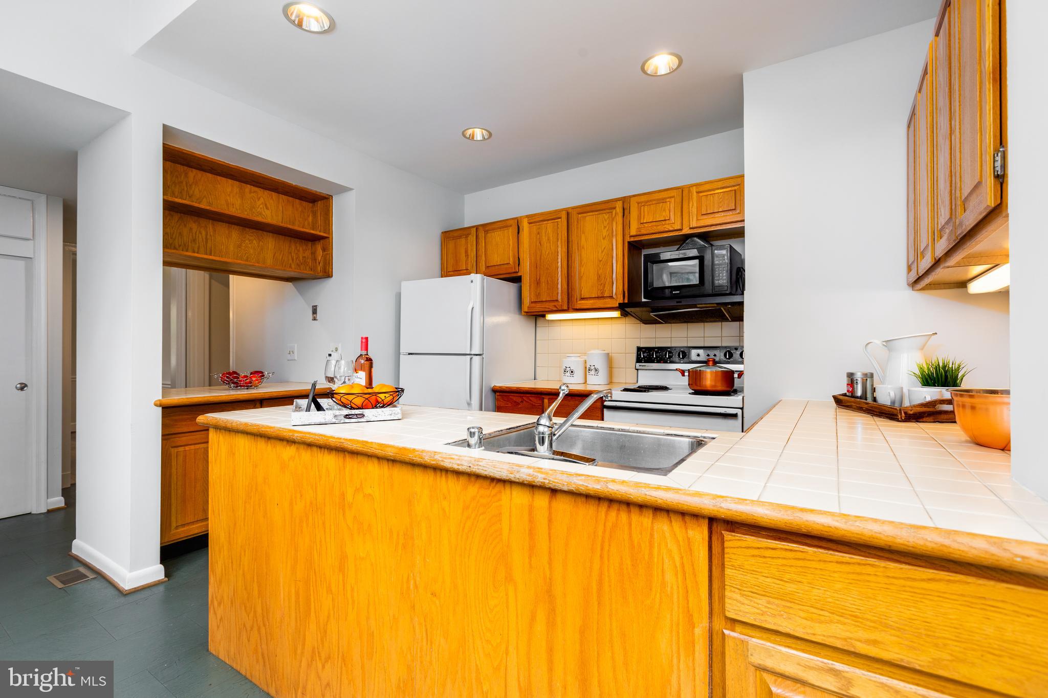 9004 Bradford Road Silver Spring, MD 20901 - Photo 11 of 60 Open Kitchen with Peninsula