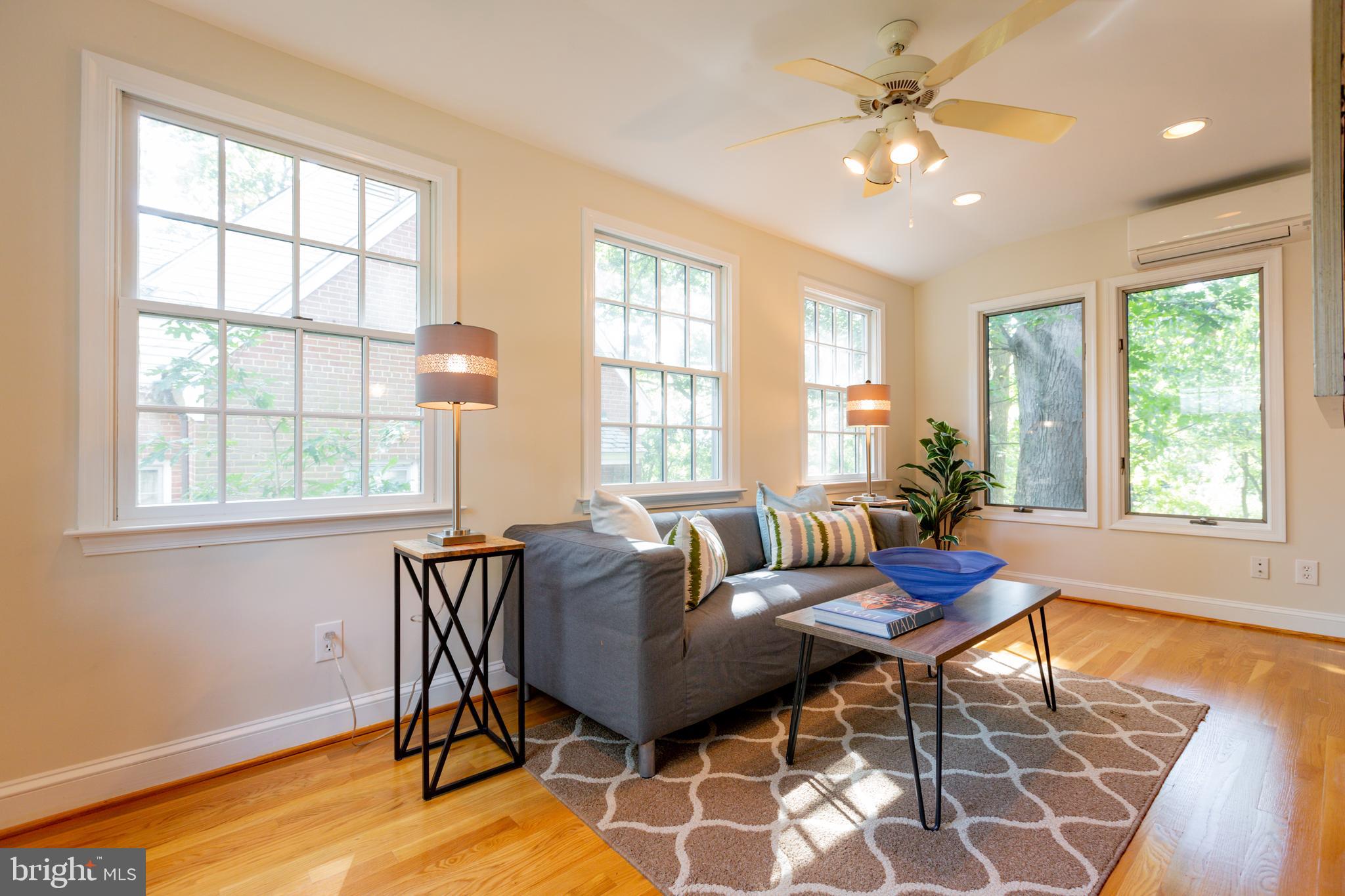 9004 Bradford Road Silver Spring, MD 20901 - Photo 6 of 60 Sunroom is Large Enough to be a Family Room