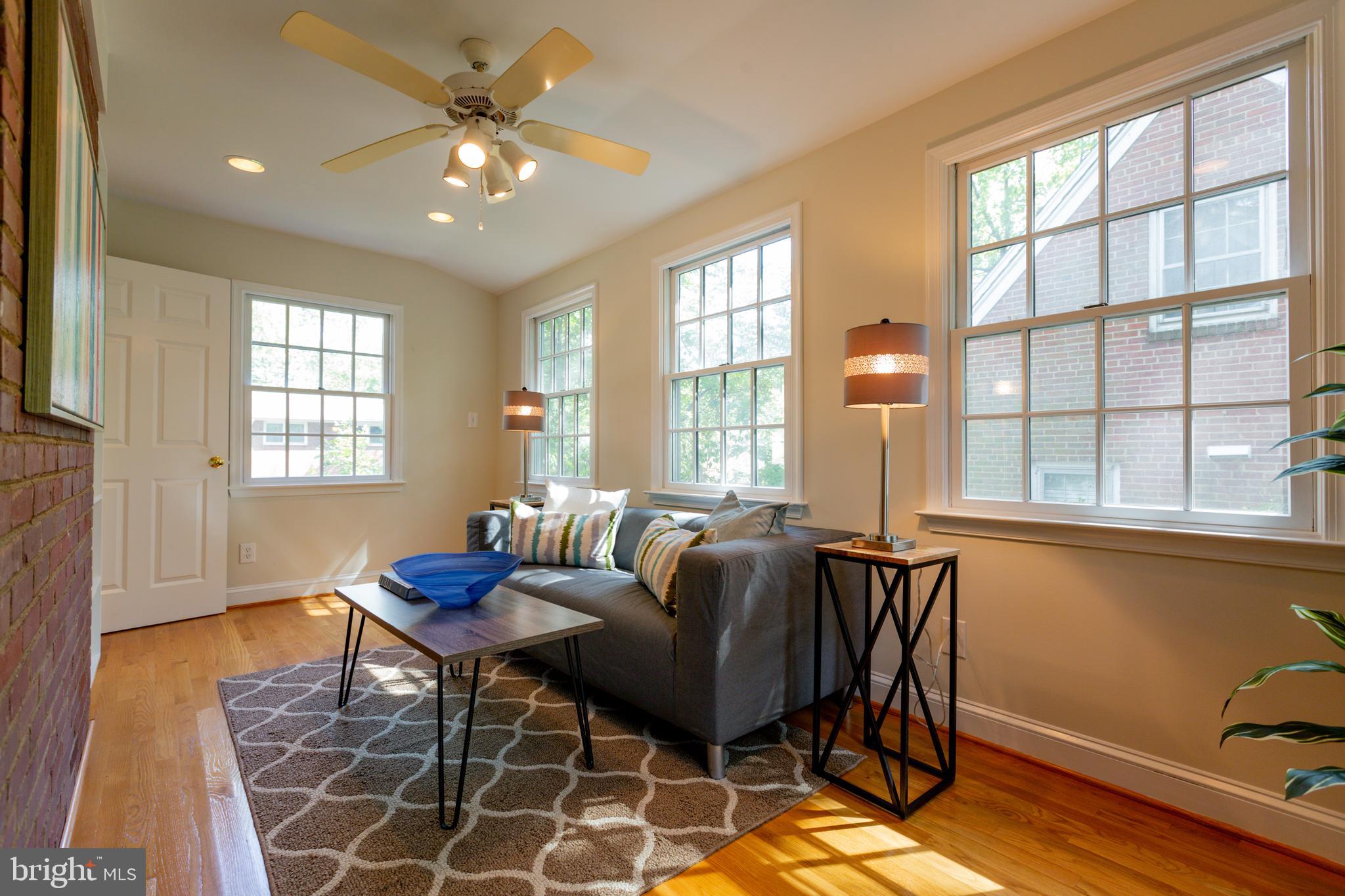 9004 Bradford Road Silver Spring, MD 20901 - Photo 7 of 60 Sunroom with Three Exposures