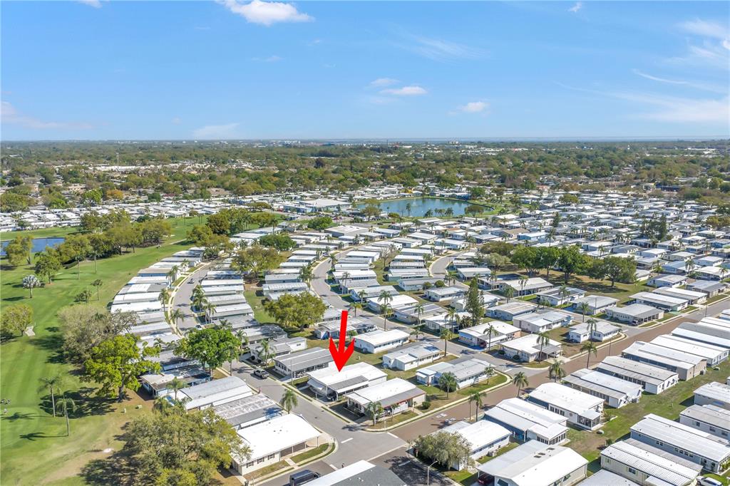 1100 South Belcher Road, Unit 502 Largo, FL 33771 - Photo 50 of 51 an aerial view of residential houses with city view
