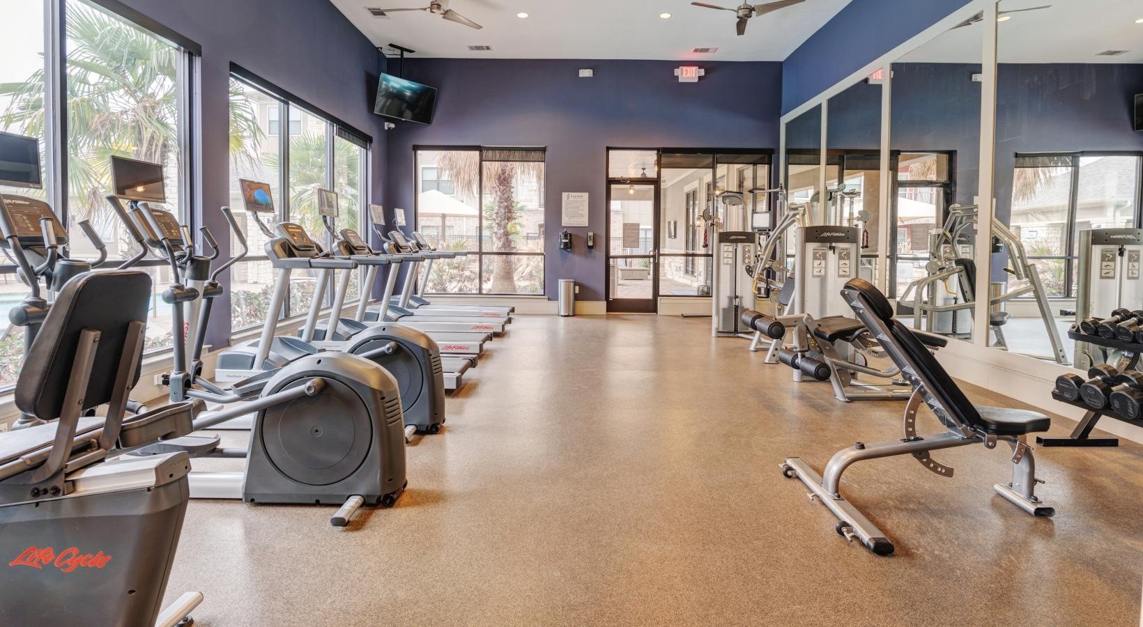 2539 Spring Cypress Road, Unit 7104 Spring, TX 77388 - Photo 8 of 13 a view of a room with gym equipment