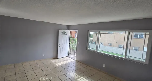 a view of an empty room with window