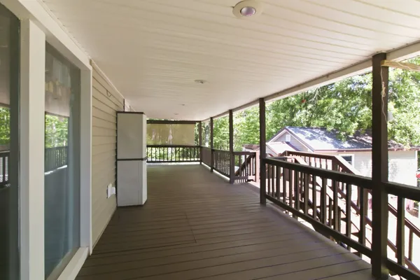 a view of a porch with furniture and a couch