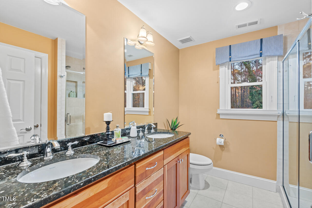 8012 Llewellyn Court Raleigh, NC 27613 - Photo 39 of 68 Hall Bath with Double Vanity