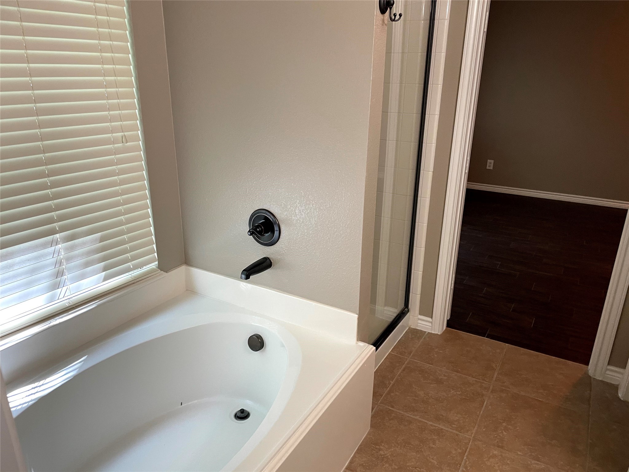 2314 Colonial Springs Lane Spring, TX 77386 - Photo 16 of 22 a bathroom with a tub