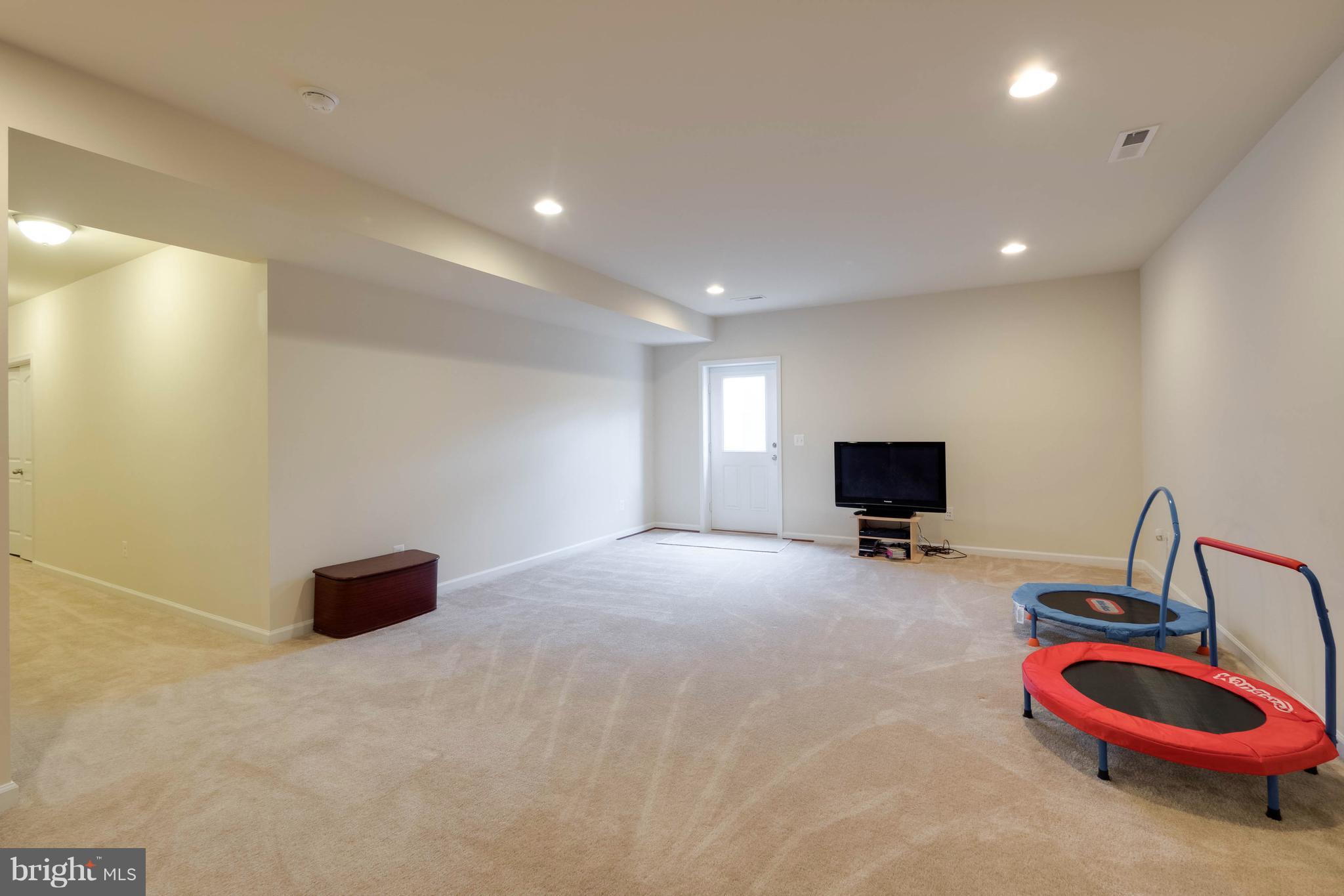 1227 Brittle Ridge Road Warrenton, VA 20187 - Photo 27 of 30 Bright Rec Room with access to Backyard