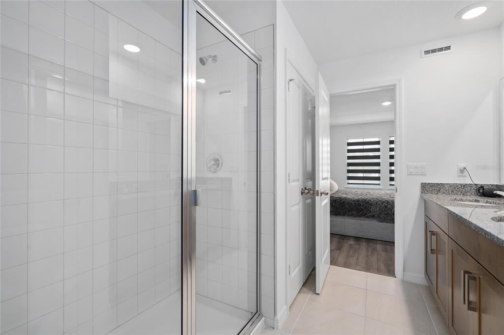 655 Clark Street Oviedo, FL 32765 - Photo 21 of 44 a view of a bathroom from the hallway