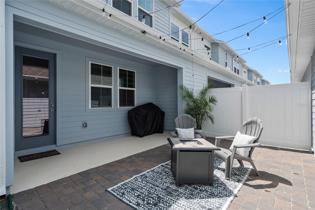 655 Clark Street Oviedo, FL 32765 - Photo 31 of 44 a view of a chairs and table in the front of a building