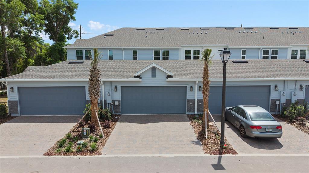 655 Clark Street Oviedo, FL 32765 - Photo 34 of 44 a front view of a house with parking