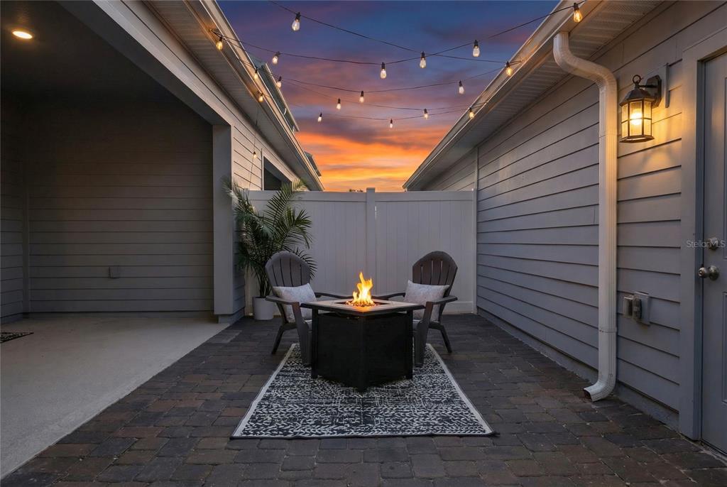 655 Clark Street Oviedo, FL 32765 - Photo 43 of 44 a view of a patio with a table and chairs