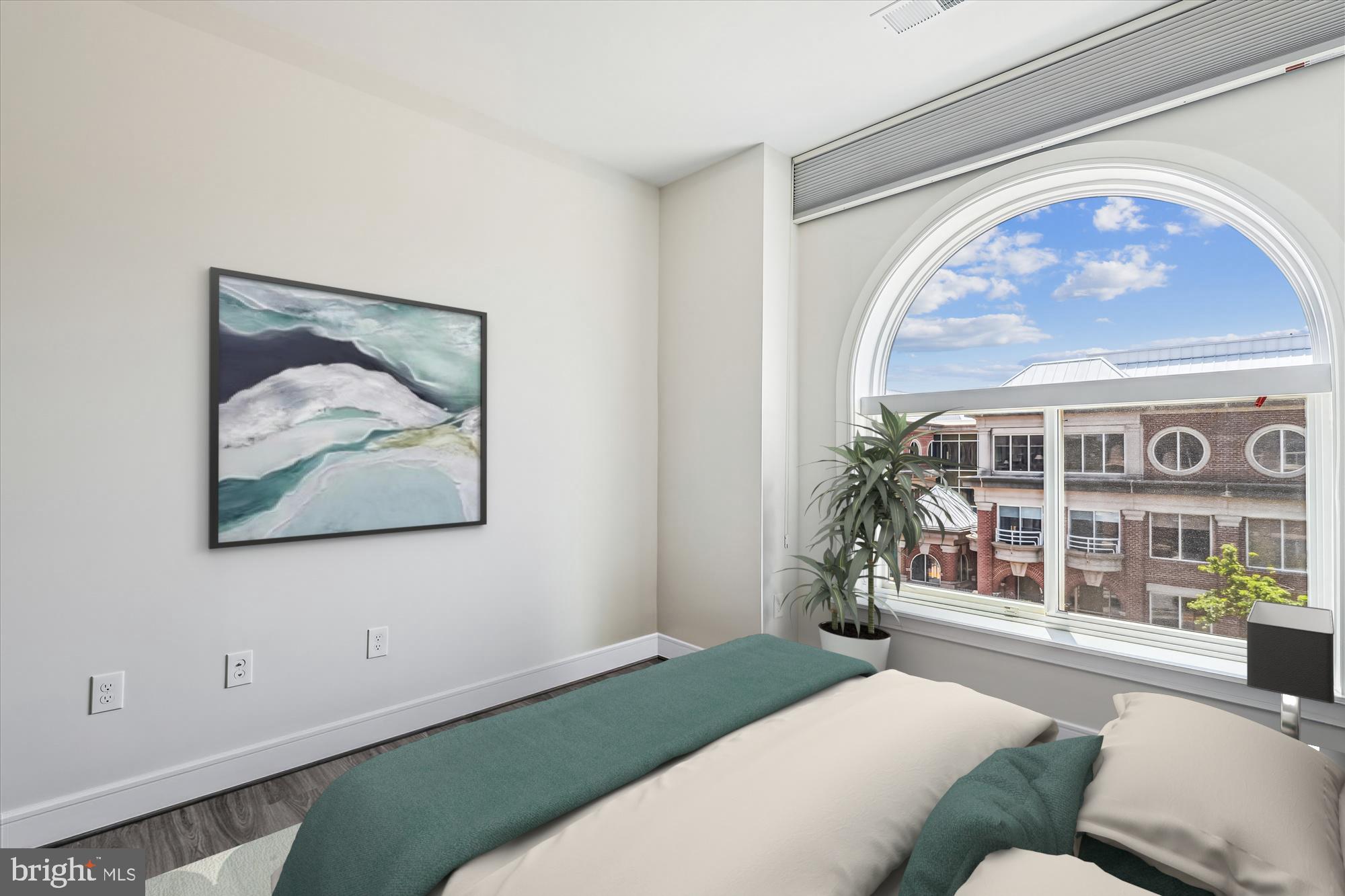 625 Slaters Lane, Unit 407 Alexandria, VA 22314 - Photo 15 of 42 Bedroom has blackout shades for ultimate comfort