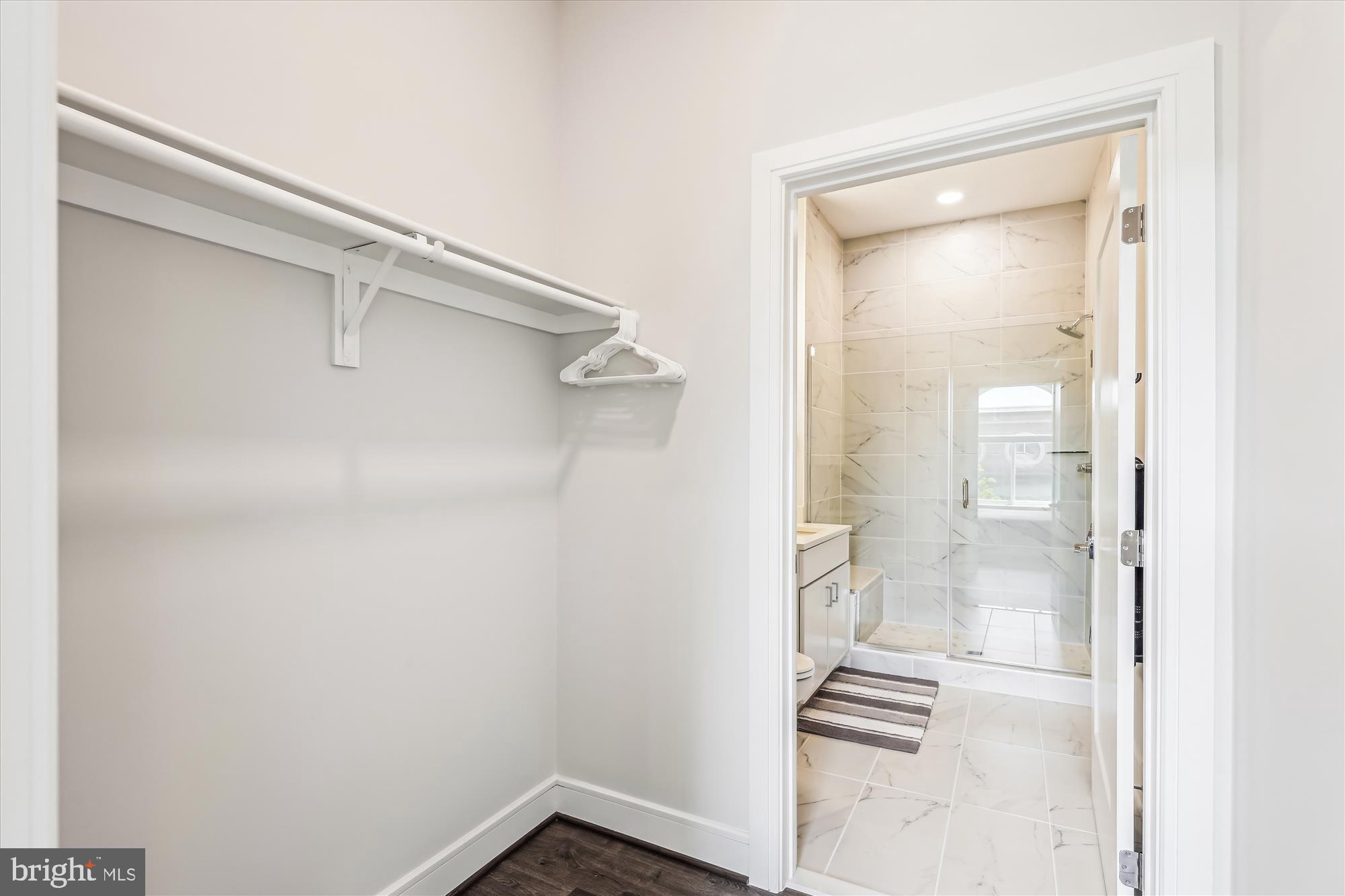 625 Slaters Lane, Unit 407 Alexandria, VA 22314 - Photo 16 of 42 Walk in Closet next to Bath