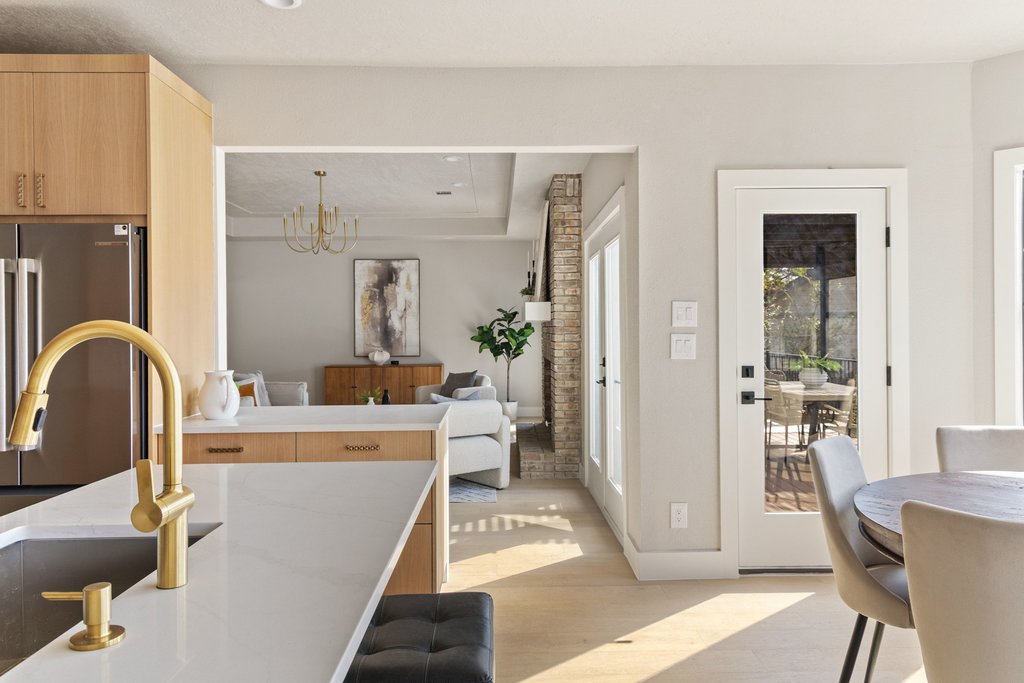 6311 Rusty Ridge Drive Austin, TX 78731 - Photo 11 of 37 a living room with furniture a rug and white walls