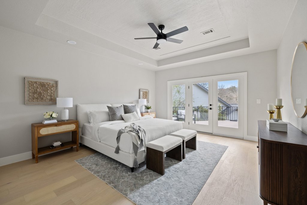 6311 Rusty Ridge Drive Austin, TX 78731 - Photo 17 of 37 a bed room with bed and a window