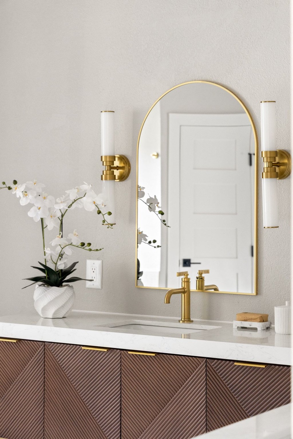 6311 Rusty Ridge Drive Austin, TX 78731 - Photo 20 of 37 a bathroom with a sink and a mirror