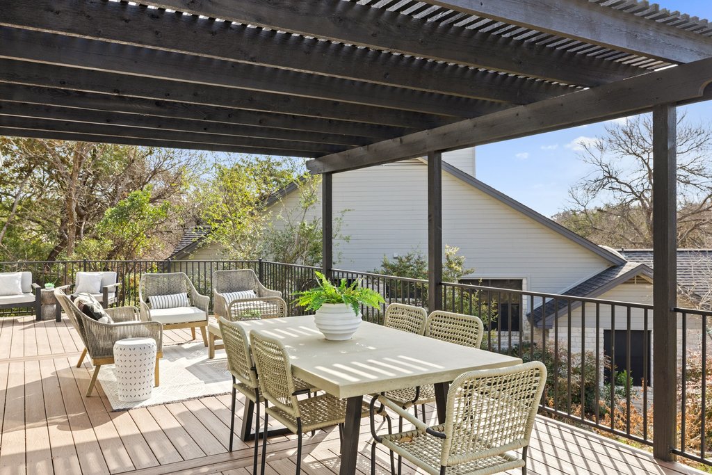 6311 Rusty Ridge Drive Austin, TX 78731 - Photo 31 of 37 a patio with glass top table and chairs