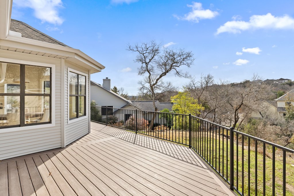 6311 Rusty Ridge Drive Austin, TX 78731 - Photo 33 of 37 a view of balcony with wooden floor and fence