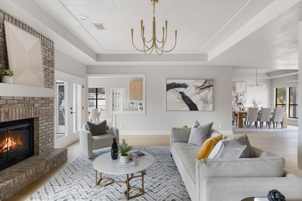 6311 Rusty Ridge Drive Austin, TX 78731 - Photo 7 of 37 a living room with furniture and a fireplace