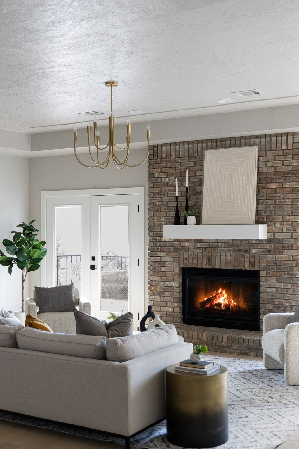 6311 Rusty Ridge Drive Austin, TX 78731 - Photo 8 of 37 a living room with furniture and a fireplace