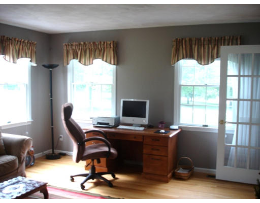 8 Redcoat Road Bedford, MA 01730 - Photo 9 of 12 a view of a workspace with furniture and a window
