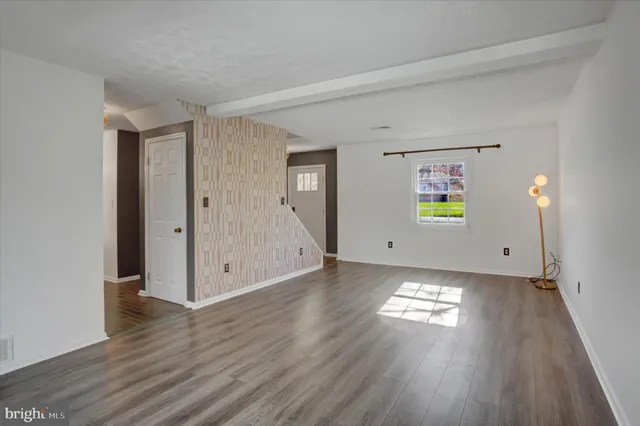 a view of a room that has a window in it