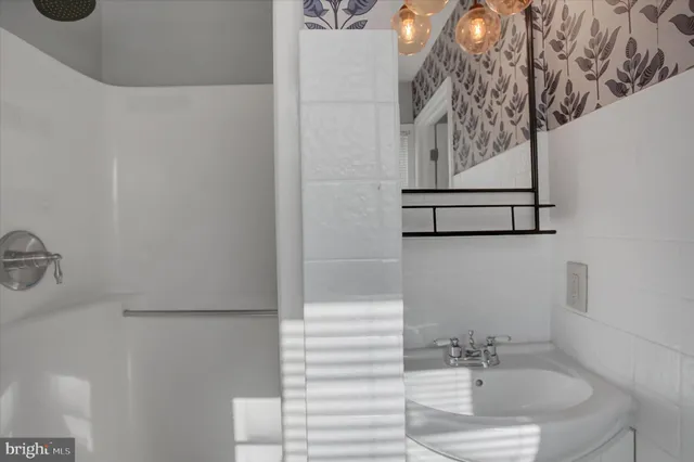 a view of a closet area with entryway